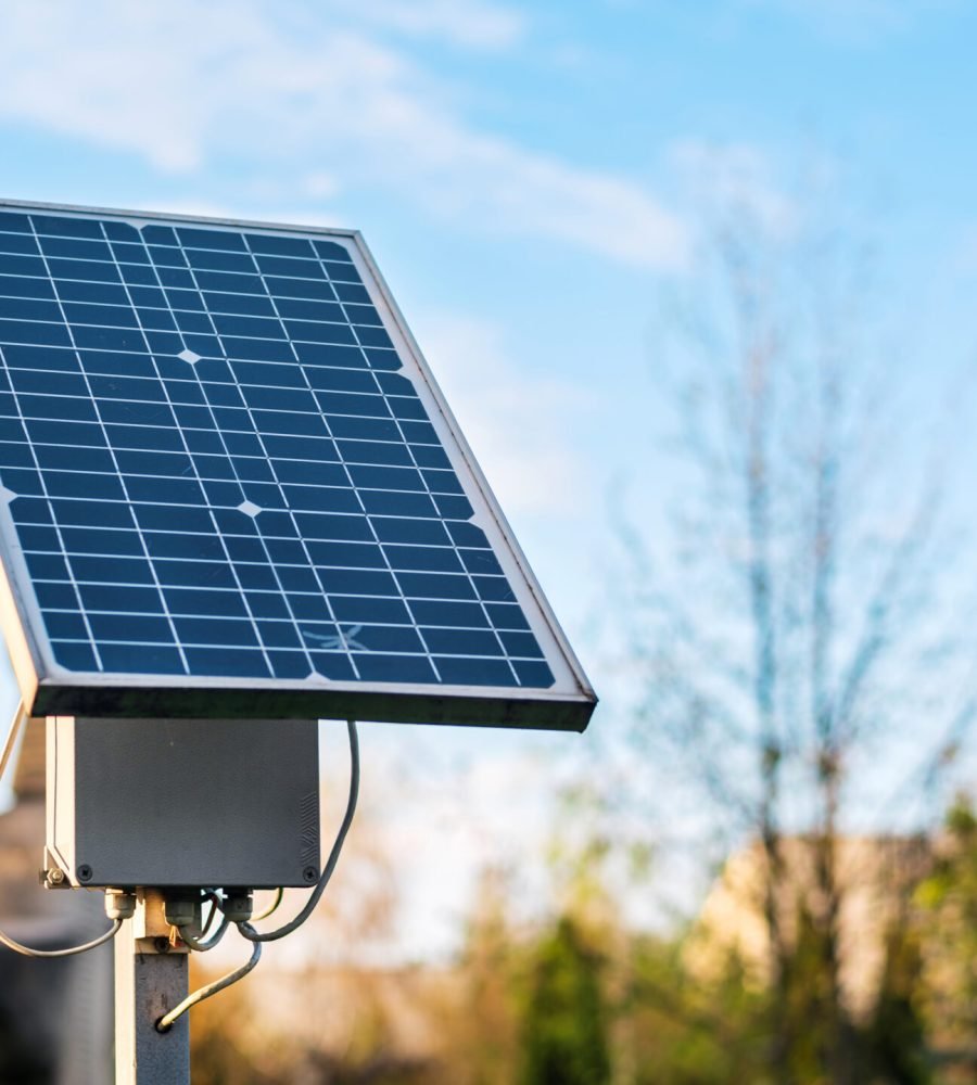 Close view of a solar panel with nature on the background